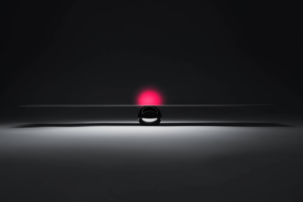 A balance scale of light with a coral glow at the centre on a dark surface.