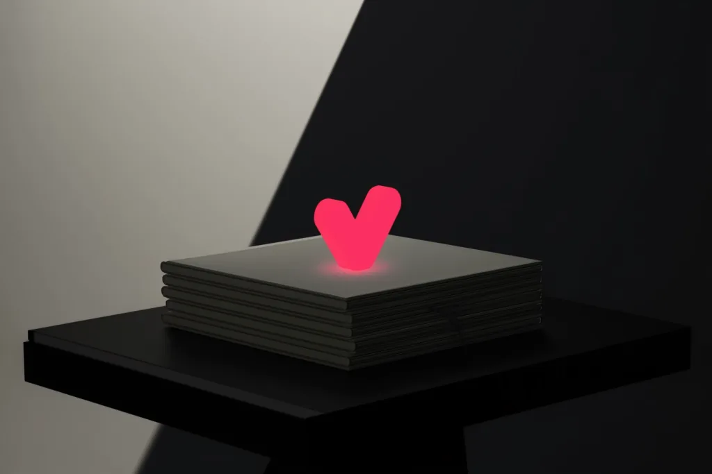 A stack of documents with a glowing coral verification mark above on a dark surface.