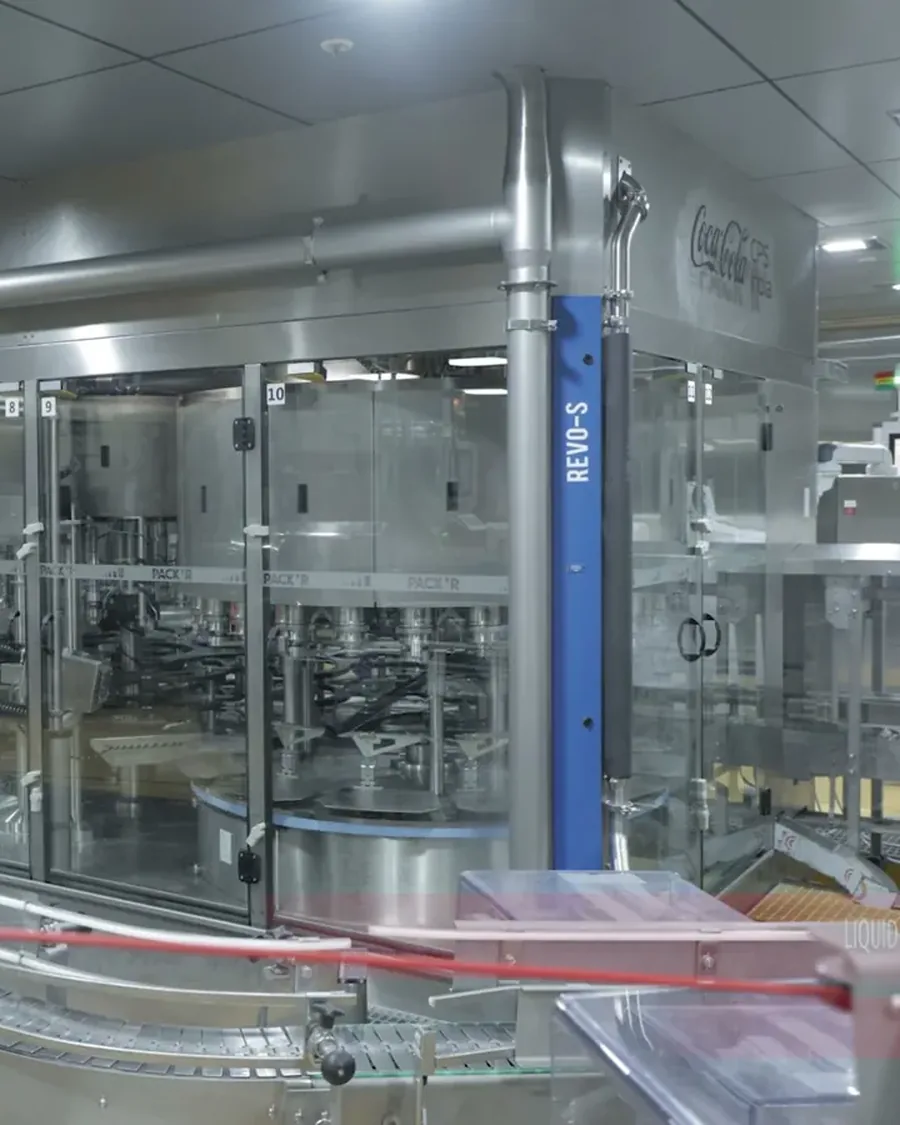 High-speed filling line at Coca-Cola CPS India's Pune plant, from DESENO's factory film